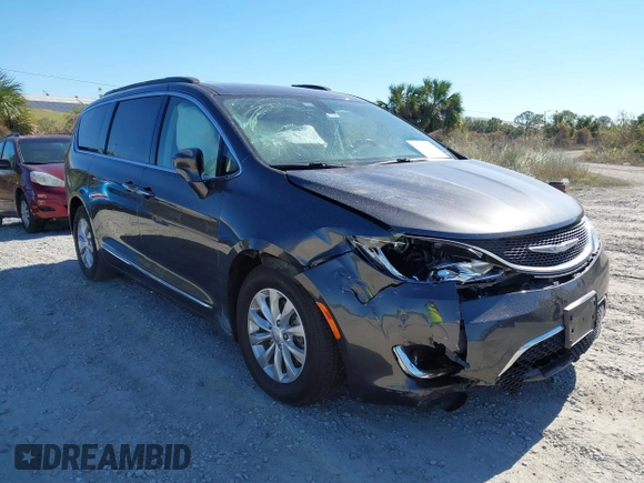 2017 Chrysler Pacifica Touring L z VIN 2C4RC1BG2HR741427, wystawiony jako IAAI lot #41299887 z przebiegiem 69 219 mil mil oraz . Historia ofert i sprzedaży dostępna na DreamBid. Obrazek 1.