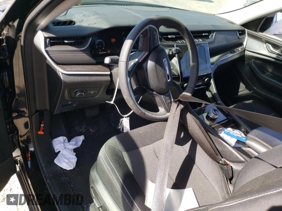 2023 Jeep Grand Cherokee Altitude with VIN 1C4RJHAG3PC532883, listed as a Copart auction lot 56899945 with 10,810 mi miles and Salvage title. Bid and sale history available at DreamBid. Image 8.