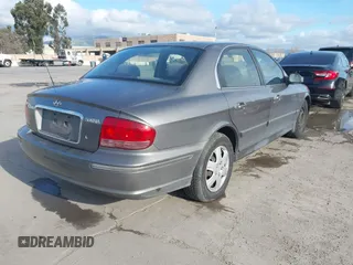 2004 Hyundai Sonata with VIN KMHWF25S84A944266, listed as a IAAI auction lot 41723386 with 159,849 mi miles. Bid and sale history available at carsss.com. Image 4.