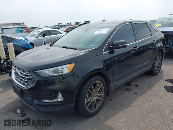 2020 Ford Edge Titanium z VIN 2FMPK3K92LBB24713, wystawiony jako IAAI lot #41949412 z przebiegiem 97 014 mil mil oraz . Historia ofert i sprzedaży dostępna na DreamBid. Obrazek 17.