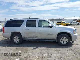 2013 Chevrolet Suburban LT with VIN 1GNSKJE78DR108955, listed as a IAAI auction lot 42004032 with 114,729 mi miles and . Bid and sale history available at DreamBid. Image 13.