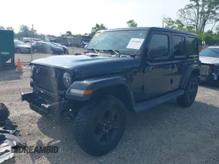 2020 Jeep Wrangler Unlimited Sahara High Altitude with VIN 1C4HJXEGXLW182581, listed as a IAAI auction lot 42612084 with 52,656 mi miles and . Bid and sale history available at DreamBid. Image 2.