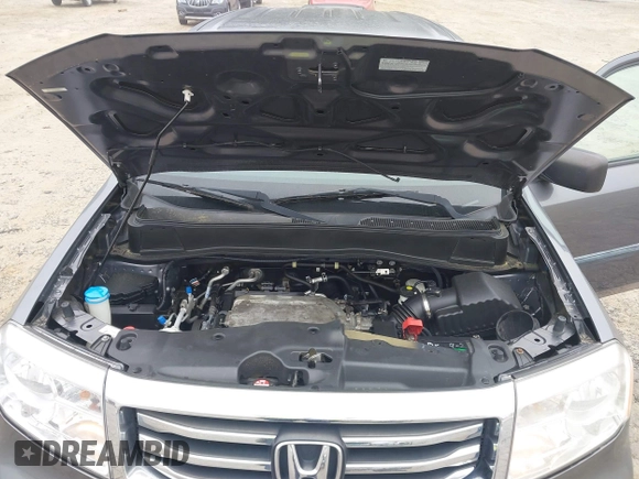 2014 Honda Pilot LX with VIN 5FNYF4H2XEB004614, listed as a IAAI auction lot 42236980 with 160,357 mi miles and . Bid and sale history available at DreamBid. Image 10.