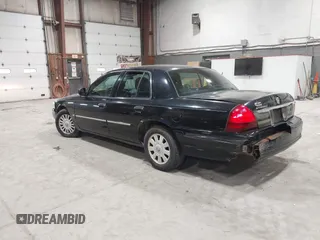 2008 Mercury Grand Marquis LS z VIN 2MEFM75V18X617284, wystawiony jako IAAI lot #41948364 z przebiegiem 106 294 mil mil oraz . Historia ofert i sprzedaży dostępna na DreamBid. Obrazek 3.