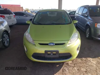 2011 Ford Fiesta SES with VIN 3FADP4FJ9BM119319, listed as a IAAI auction lot 42025691 with 104,516 mi miles. Bid and sale history available at carsss.com. Image 6.