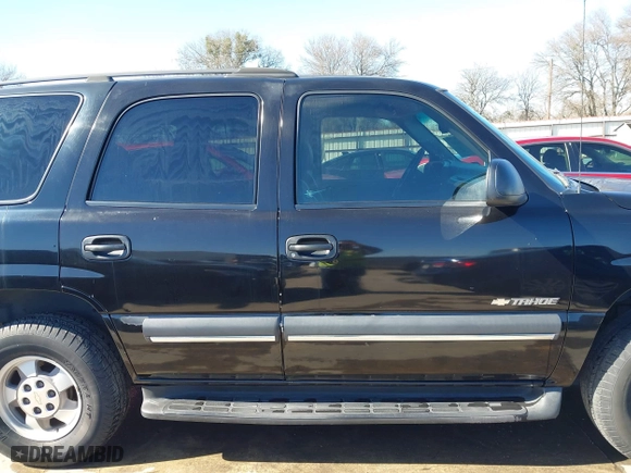 2003 Chevrolet Tahoe LS with VIN 1GNEC13V63R245581, listed as a IAAI auction lot 41599241 with 234,028 mi miles. Bid and sale history available at carsss.com. Image 13.