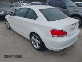 2010 BMW 1 Series 128i with VIN WBAUP9C58AVL89335, listed as a IAAI auction lot 41853847 with Not Provided miles and . Bid and sale history available at carsss.com. Image 3.