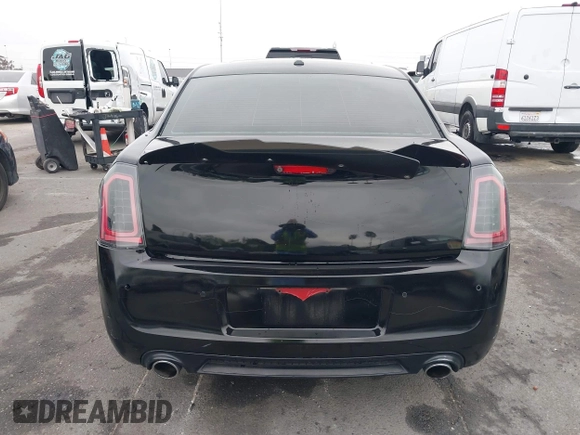 2013 Chrysler 300 SRT-8 with VIN 2C3CCAFJ9DH576184, listed as a IAAI auction lot 42162364 with 104,021 mi miles and . Bid and sale history available at carsss.com. Image 17.