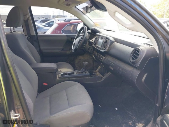 2019 Toyota Tacoma 4WD SR with VIN 3TMCZ5AN5KM204187, listed as a IAAI auction lot 40318136 with 105,409 mi miles. Bid and sale history available at carsss.com. Image 5.