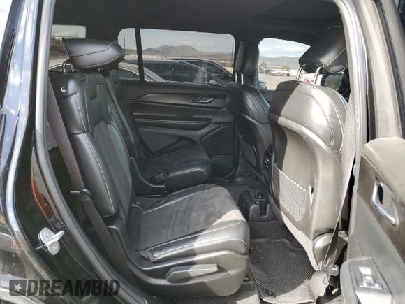 2023 Jeep Grand Cherokee Altitude z VIN 1C4RJKAG5P8806097, wystawiony jako Copart lot #51516785 z przebiegiem 25 245 mil mil oraz Szkoda całkowita • Salvage title. Historia ofert i sprzedaży dostępna na DreamBid. Obrazek 11.