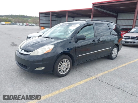 2008 Toyota Sienna XLE with VIN 5TDZK22C18S161342, listed as a IAAI auction lot 42027277 with 198,489 mi miles. Bid and sale history available at carsss.com. Image 2.