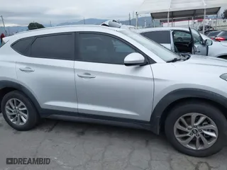 2016 Hyundai Tucson SE with VIN KM8J33A47GU242183, listed as a IAAI auction lot 41772964 with 97,527 mi miles. Bid and sale history available at carsss.com. Image 12.