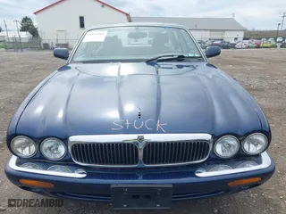 1998 Jaguar XJ with VIN SAJHX124XWC844575, listed as a IAAI auction lot 41951600 with 97,458 mi miles. Bid and sale history available at carsss.com. Image 10.