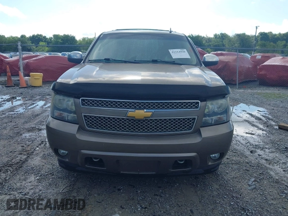 2012 Chevrolet Tahoe LT z VIN 1GNSCBE08CR320257, wystawiony jako IAAI lot #42214920 z przebiegiem 189 532 mil mil oraz . Historia ofert i sprzedaży dostępna na DreamBid. Obrazek 12.