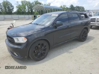 2014 Dodge Durango SXT z VIN 1C4RDJAG8EC278969, wystawiony jako Copart lot #58873804 z przebiegiem 133 751 mil mil oraz Szkoda całkowita • Salvage title. Historia ofert i sprzedaży dostępna na DreamBid. Obrazek 1.