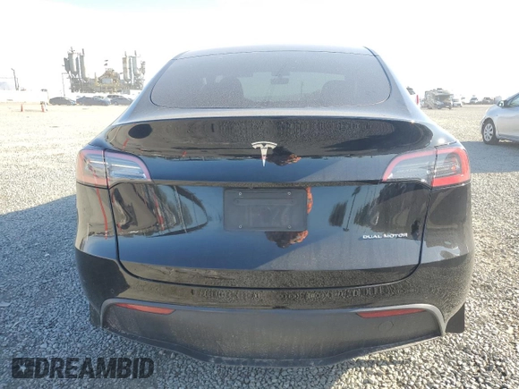 2021 Tesla Model Y Long Range z VIN 5YJYGDEE3MF092495, wystawiony jako Copart lot #50664225 z przebiegiem 72 947 mil mil oraz Szkoda całkowita • Salvage title. Historia ofert i sprzedaży dostępna na DreamBid. Obrazek 6.