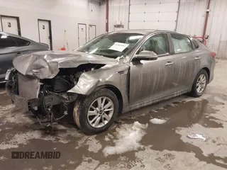 2017 Kia Optima LX with VIN 5XXGT4L33HG148897, listed as a IAAI auction lot 41565592 with 61,471 mi miles and . Bid and sale history available at carsss.com. Image 2.