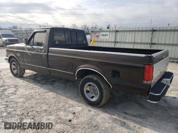 1991 Ford F-150 with VIN 1FTEF15N9MLA28124, listed as a Copart auction lot 83220464 with 49,411 mi miles and Salvage Title. Bid and sale history available at carsss.com. Image 2.