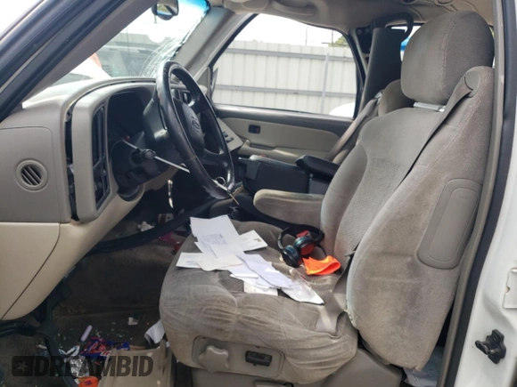 2002 Chevrolet Suburban LT with VIN 1GNEC16Z32J112076, listed as a Copart auction lot 63462715 with Not provided miles and Salvage title. Bid and sale history available at DreamBid. Image 7.