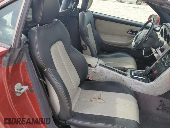 1999 Mercedes-Benz SLK-Class with VIN WDBKK47F0XF132802, listed as a Copart auction lot 69818544 with 123,026 mi miles and Salvage Title. Bid and sale history available at carsss.com. Image 10.