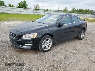 2015 Volvo S60 T5 Drive-E Premier with VIN YV140MFK0F1355779, listed as a Copart auction lot 57131595 with 111,678 mi miles and Salvage title. Bid and sale history available at DreamBid. Image 1.