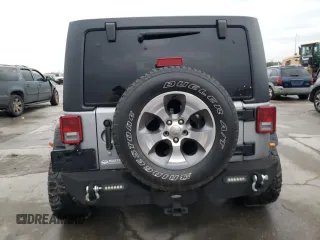 2018 Jeep Wrangler JK Unlimited Sahara with VIN 1C4HJWEG3JL922027, listed as a Copart auction lot 84173794 with 113,226 mi miles and Salvage Title. Bid and sale history available at carsss.com. Image 6.