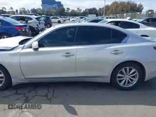 2014 Infiniti Q50 Premium z VIN JN1BV7AP9EM684709, wystawiony jako IAAI lot #41901877 z przebiegiem 91 425 mil mil oraz . Historia ofert i sprzedaży dostępna na DreamBid. Obrazek 15.