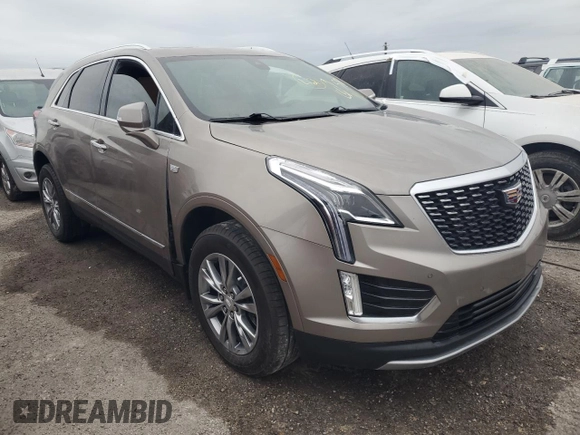 2022 Cadillac XT5 FWD Premium Luxury z VIN 1GYKNCRS1NZ126722, wystawiony jako Copart lot #74231714 z przebiegiem Nie podano mil oraz Nie do naprawy • Non repairable. Historia ofert i sprzedaży dostępna na DreamBid. Obrazek 4.
