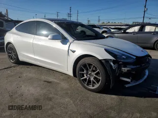 2020 Tesla Model 3 Long Range with VIN 5YJ3E1EB0LF665887, listed as a Copart auction lot 48985245 with 50,309 mi miles and Salvage Title. Bid and sale history available at DreamBid. Image 4.