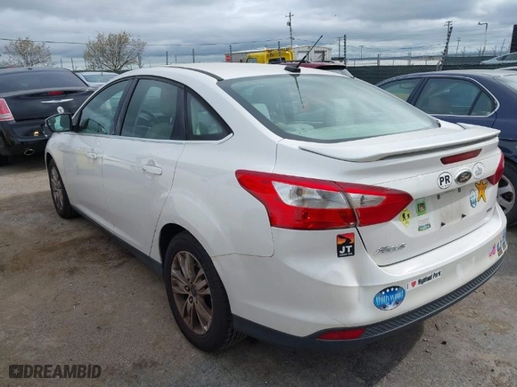 2012 Ford Focus SEL with VIN 1FAHP3H27CL387869, listed as a IAAI auction lot 41976528 with 106,927 mi miles. Bid and sale history available at carsss.com. Image 3.