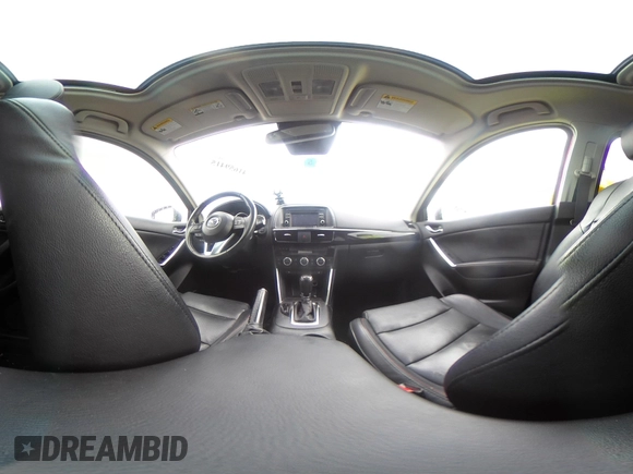 2015 Mazda CX-5 Grand Touring with VIN JM3KE4DY0F0479392, listed as a IAAI auction lot 41659415 with 141,403 mi miles. Bid and sale history available at carsss.com. Image 18.