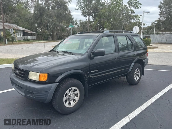 1999 Isuzu Rodeo S z VIN 4S2CK58W7X4357230, wystawiony jako Copart lot #45724855 z przebiegiem 130 446 mil mil oraz Czysty tytuł • Clean title. Historia ofert i sprzedaży dostępna na DreamBid. Obrazek 2.