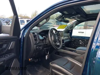 2021 Ram 1500 Limited with VIN 1C6SRFHT1MN578723, listed as a IAAI auction lot 41948681 with 75,715 mi miles and . Bid and sale history available at DreamBid. Image 5.