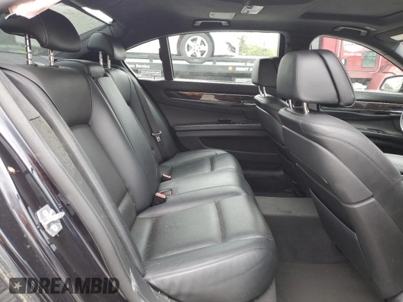 2015 BMW 7 Series 750Li with VIN WBAYE8C50FD781398, listed as a Copart auction lot 49519484 with 54,075 mi miles and Salvage Title. Bid and sale history available at carsss.com. Image 10.
