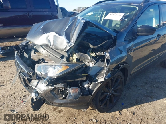 2019 Ford Escape SE z VIN 1FMCU0GD4KUA91551, wystawiony jako IAAI lot #41590151 z przebiegiem Nie podano mil oraz . Historia ofert i sprzedaży dostępna na DreamBid. Obrazek 6.