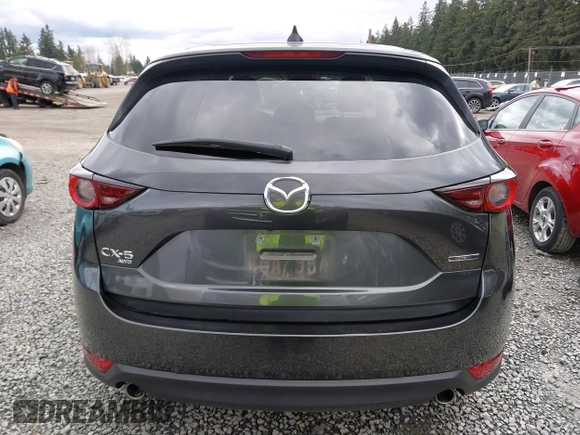 2021 Mazda CX-5 Touring with VIN JM3KFBCM2M0484011, listed as a IAAI auction lot 41825954 with 48,958 mi miles. Bid and sale history available at carsss.com. Image 16.