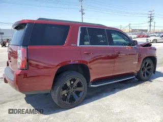 2019 GMC Yukon SLE with VIN 1GKS1AKC9KR355643, listed as a Copart auction lot 52050855 with 50,729 mi miles and Salvage Title. Bid and sale history available at carsss.com. Image 3.