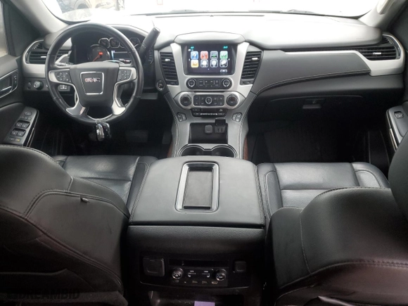 2019 GMC Yukon SLT with VIN 1GKS2BKC8KR175573, listed as a Copart auction lot 43126755 with 136,012 mi miles and Salvage Title. Bid and sale history available at carsss.com. Image 8.