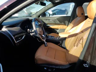2021 Cadillac XT4 FWD Premium Luxury z VIN 1GYFZCR45MF080027, wystawiony jako Copart lot #46195835 z przebiegiem Nie podano mil oraz Nie do naprawy • Non repairable. Historia ofert i sprzedaży dostępna na DreamBid. Obrazek 7.