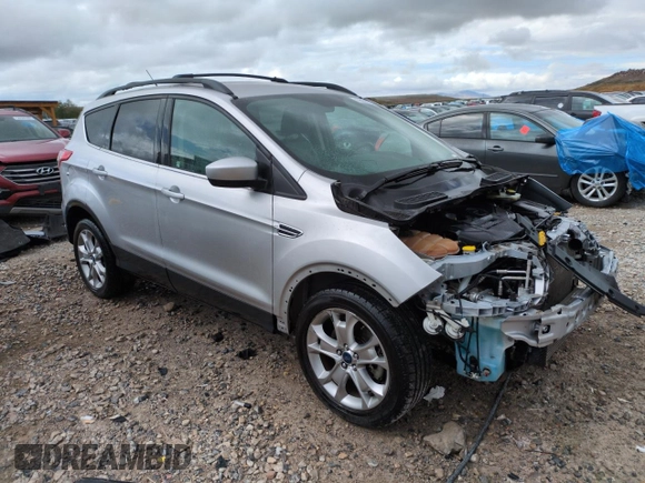 2016 Ford Escape SE z VIN 1FMCU0G91GUC59990, wystawiony jako Copart lot #56956395 z przebiegiem 112 706 mil mil oraz Szkoda całkowita • Salvage title. Historia ofert i sprzedaży dostępna na DreamBid. Obrazek 4.
