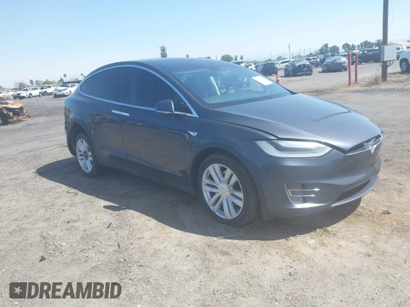 2016 Tesla Model X 70D z VIN 5YJXCAE27GF002541, wystawiony jako IAAI lot #41957228 z przebiegiem 77 199 mil mil oraz . Historia ofert i sprzedaży dostępna na DreamBid. Obrazek 1.
