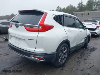 2019 Honda CR-V EX-L with VIN JHLRW2H86KX001274, listed as a IAAI auction lot 41953859 with 73,599 mi miles. Bid and sale history available at carsss.com. Image 4.