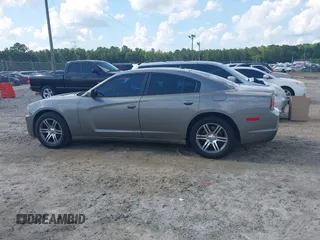 2014 Dodge Charger Police z VIN 2C3CDXAT8EH186106, wystawiony jako IAAI lot #42360605 z przebiegiem 126 794 mil mil oraz . Historia ofert i sprzedaży dostępna na DreamBid. Obrazek 13.