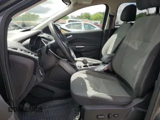 2016 Ford Escape SE z VIN 1FMCU9G95GUB48539, wystawiony jako Copart lot #57028905 z przebiegiem 124 307 mil mil oraz Szkody całkowita. Historia ofert i sprzedaży dostępna na DreamBid. Obrazek 7.