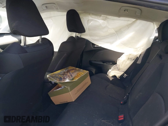 2022 Toyota Prius L Eco with VIN JTDKAMFU7N3154041, listed as a IAAI auction lot 41896210 with 46,382 mi miles and . Bid and sale history available at DreamBid. Image 8.