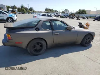 1987 Porsche 944 with VIN WP0AB0944HN472642, listed as a Copart auction lot 55420985 with 122,200 mi miles and Salvage title. Bid and sale history available at DreamBid. Image 3.