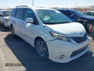 2014 Toyota Sienna SE with VIN 5TDXK3DC1ES417081, listed as a IAAI auction lot 41850444 with 173,545 mi miles. Bid and sale history available at carsss.com. Image 1.