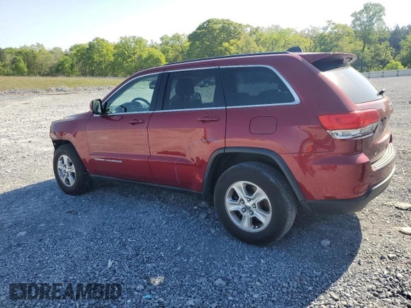 2014 Jeep Grand Cherokee Laredo with VIN 1C4RJEAG7EC274573, listed as a Copart auction lot 52637255 with 156,409 mi miles and Salvage Title. Bid and sale history available at DreamBid. Image 2.