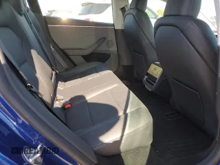 2025 Tesla Model 3 Long Range with VIN 5YJ3E1EA6SF935839, listed as a Copart auction lot 57665785 with 5,996 mi miles and Salvage title. Bid and sale history available at DreamBid. Image 10.