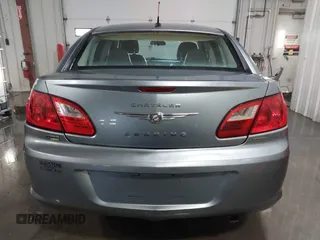 2010 Chrysler Sebring Limited z VIN 1C3CC5FD8AN134758, wystawiony jako IAAI lot #41190558 z przebiegiem 259 904 mil mil oraz . Historia ofert i sprzedaży dostępna na DreamBid. Obrazek 16.